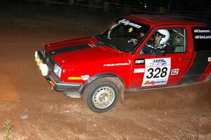 Mychal Summers / Ryan DesLaurier drift their VW Golf through the ruts at the final spectator corner on SS17, Gratiot Lake 2