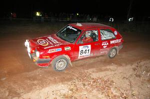 Daryn Chernick / Heidi Nunnemacher drift their VW GTI through the ruts at the spectator point on SS17, Gratiot Lake 2.