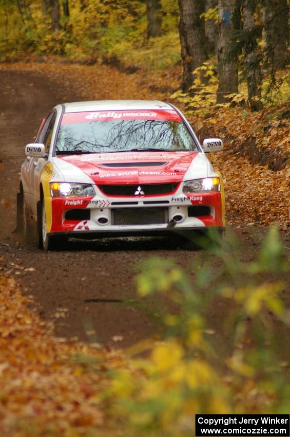 Arkadiusz Gruszka / Michal Chodan at speed down a straight on SS2, Beacon Hill, in their Mitsubishi Lancer Evo 9.