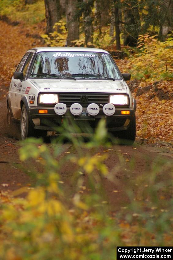 Michel Hoche-Mong / Jimmy Brandt at speed in their VW GTI down a straight on SS2, Beacon Hill.