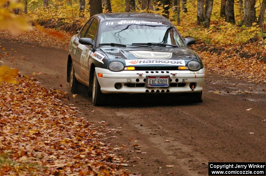 Chris Greenhouse / Don DeRose at speed down a straight on SS2, Beacon Hill, in their Plymouth Neon.