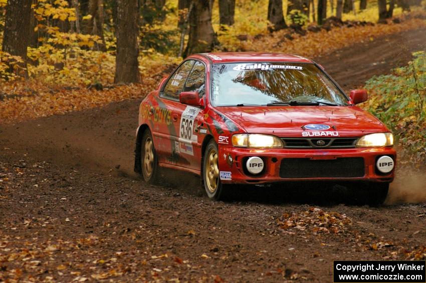 Matt Marker / Ben Slocum drift their Subaru Impreza through a sweeper on SS2, Beacon Hill.