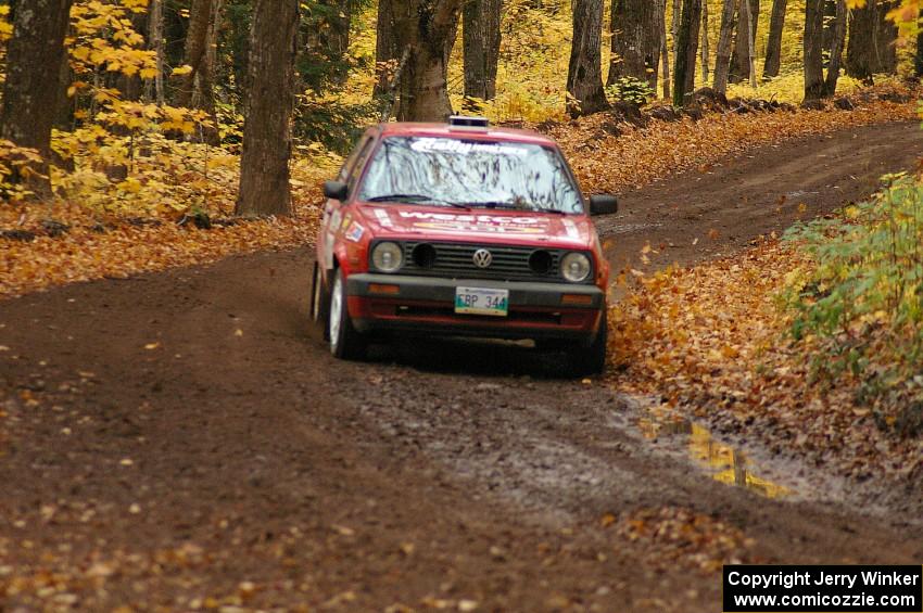 Daryn Chernick / Heidi Nunnemacher drift through a sweeper near the end of SS2, Beacon Hill, in their VW GTI.