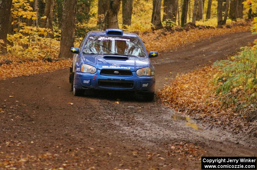 Slawomir Balda / Janusz Topor drift through a sweeper on SS2, Beacon Hill, in their Subaru WRX.