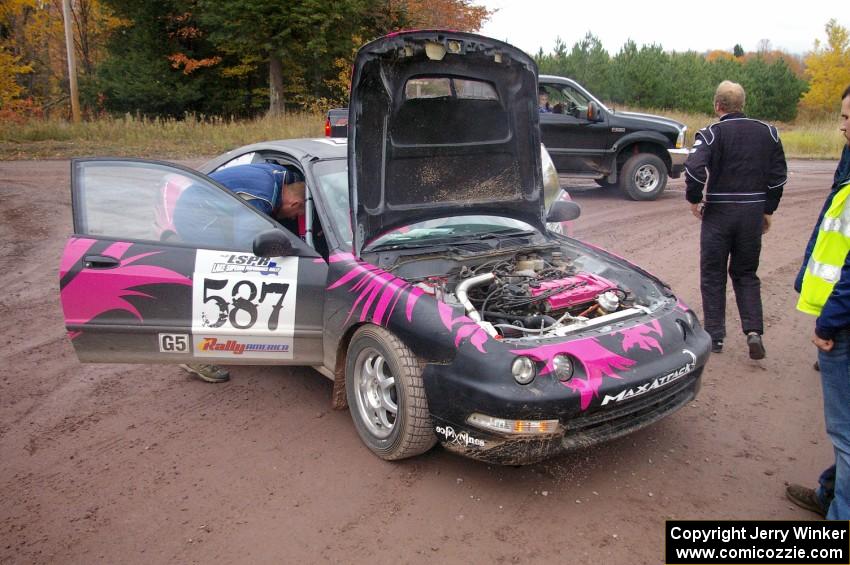 The Matt Johnston / Luke Wilcox Acura Integra sits by the side of the road with a blown engine at the end of SS2, Beacon Hill.