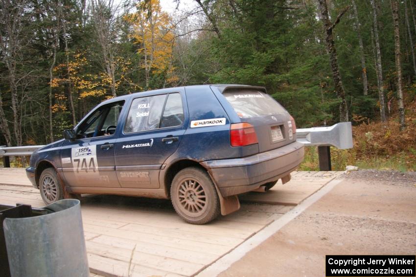 Paul Koll / Carl Seidel transit their VW Golf out of SS3.