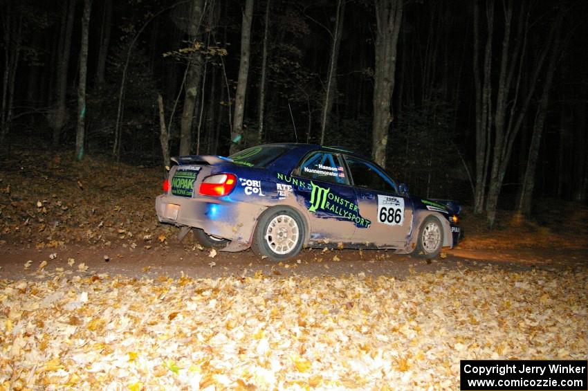 The Heath Nunnemacher / Travis Hanson Subaru WRX blasts down a leaf covered road near the finish of SS5.