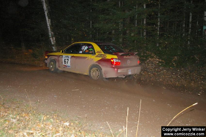 Bryan Pepp / Jerry Stang fly down a straight near the flying finish of SS5 in their Subaru WRX.