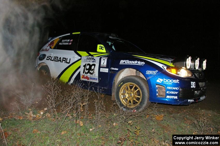 The Subaru WRX STi of Travis Pastrana / John Buffum apexes a 90-right on SS7.