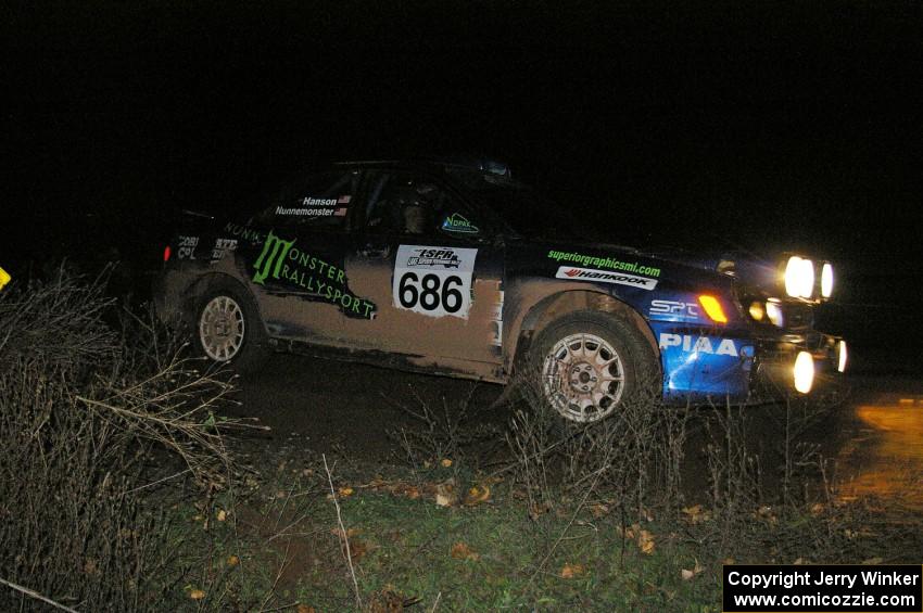 Heath Nunnemacher / Travis Hanson drift their Subaru WRX through the spectator 90-right on SS7.