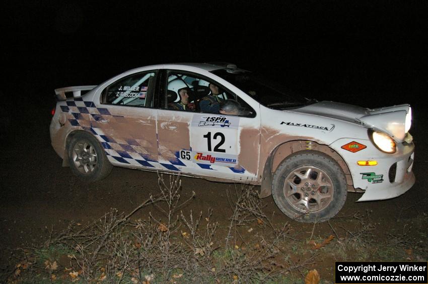 Zach Babcock / Jeff Miller set up for a 90-right on SS7 in their Dodge SRT-4.