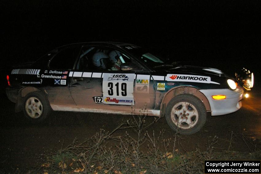 Chris Greenhouse / Don DeRose slide through a 90-right at the spectator location on SS7 in their Plymouth Neon.