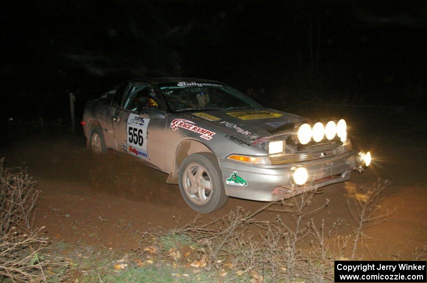 Spencer Prusi / Mike Amicangelo drift through a 90-right at the spectator location on SS7 in their Eagle Talon.