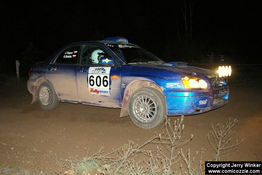 Slawomir Balda / Janusz Topor drift through a 90-right at the spectator point on SS7 in their Subaru WRX.