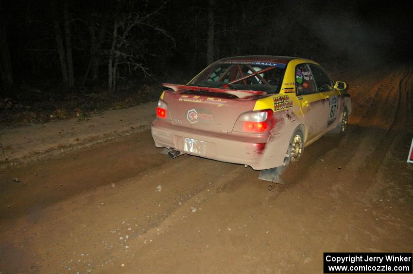 Bryan Pepp / Jerry Stang blast away from the start of SS9, Menge Creek, in their Subaru WRX .