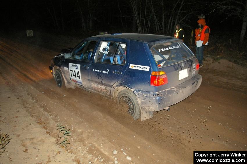 Paul Koll / Carl Seidel launch a spray of gravel at the start of SS9, Menge Creek, in their VW Golf.