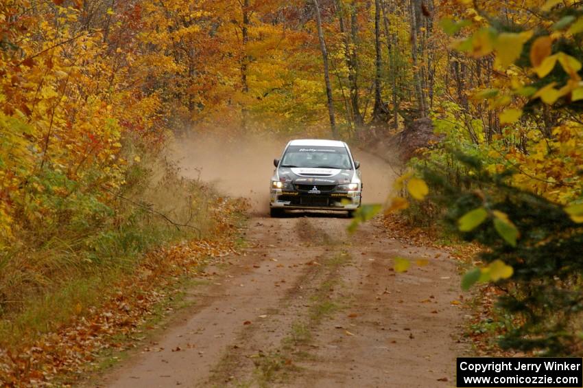 The Andi Mancin / Maciej Wislawski Mitsubishi Evo 9 blasts down the final straight into the finish of SS10, Gratiot Lake 1.