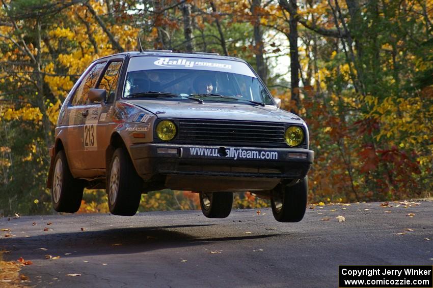 Josh Wimpey / Jeremy Wimpey get nice air at the midpoint jump on Brockway 1, SS13, in their VW GTI.