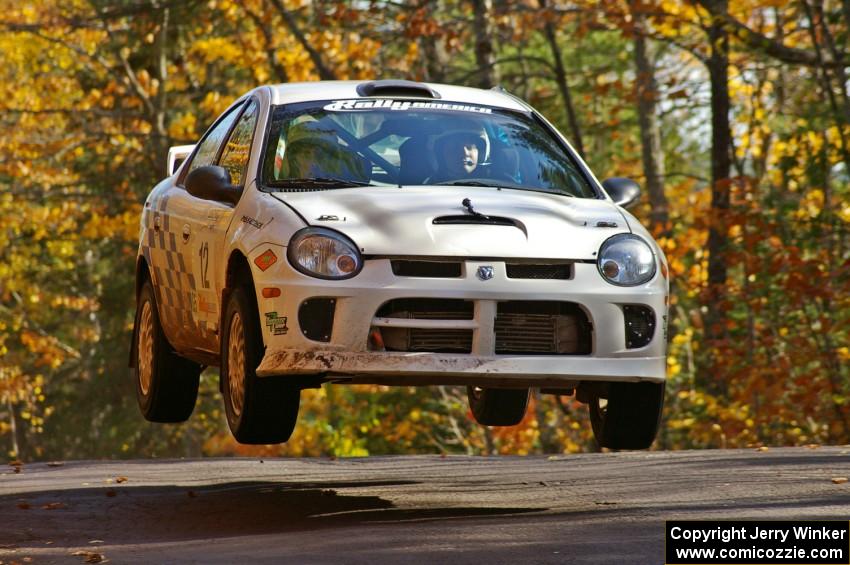 Zach Babcock / Jeff Miller get nice air at the midpoint of SS13, Brockway 1, in their Dodge SRT-4.