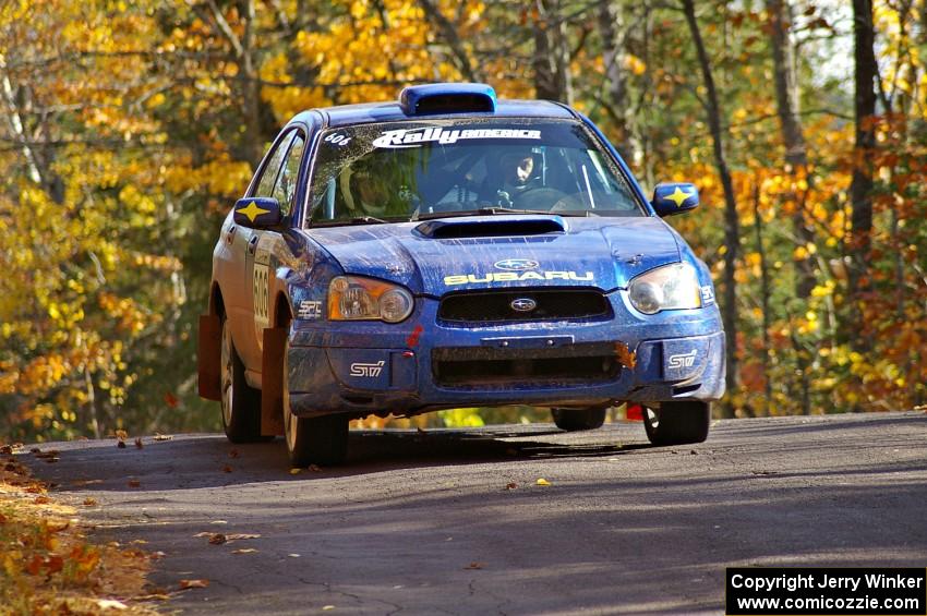 Slawomir Balda / Janusz Topor take it easy and catch no air over the midpoint jump on Brockway 1, SS13, in their Subaru WRX.