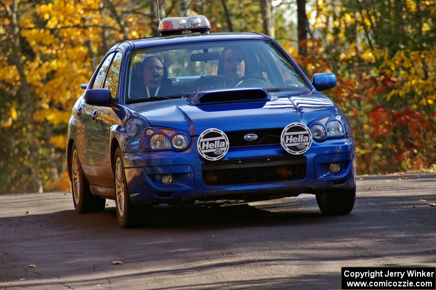 Tim Maskus works as med sweep for SS13, Brockway 1, in his Subaru WRX.