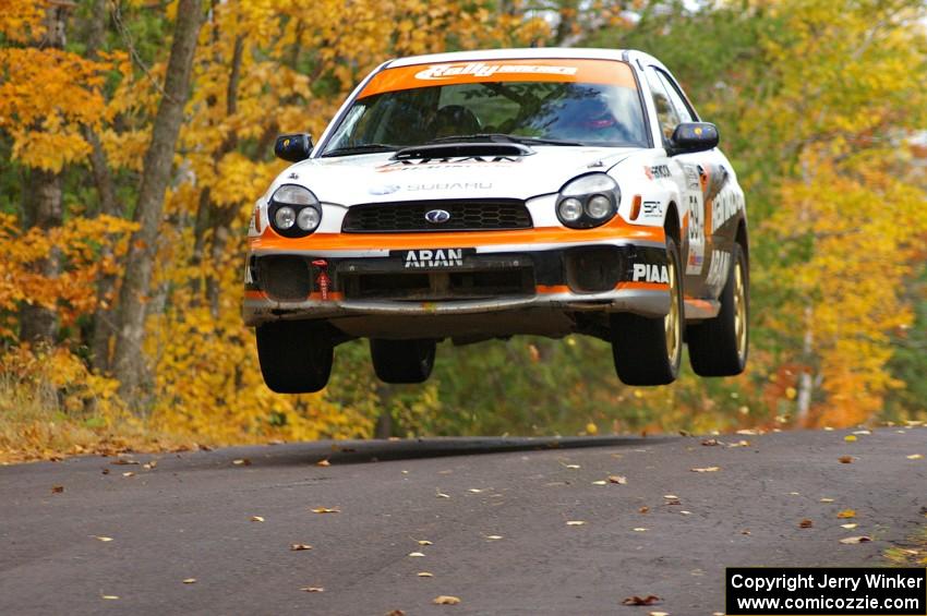 Pat Moro / Mike Rossey catch nice air in their Subaru WRX at the midpoint jump on Brockway 2, SS14.
