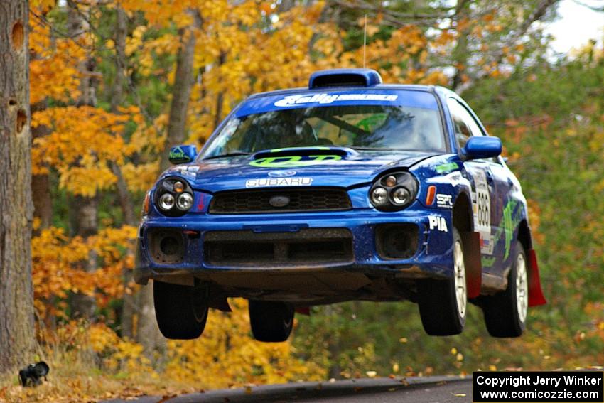 Heath Nunnemacher / Travis Hanson launch their Subaru WRX nicely at the midpoint jump on Brockway 2, SS14.