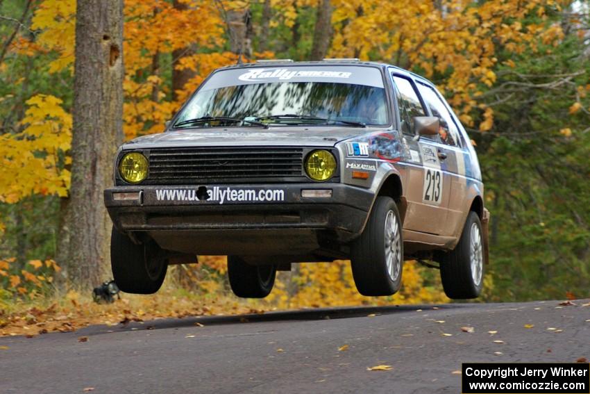 Josh Wimpey / Jeremy Wimpey get nice air at the midpoint jump on Brockway 2, SS14, in their VW GTI.
