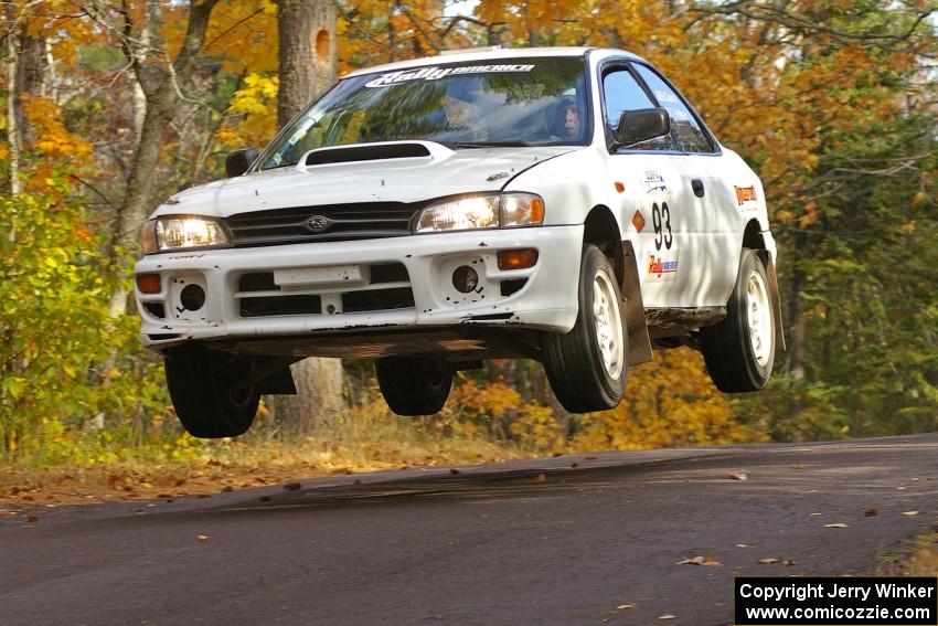 The Bob Olson / Conrad Ketelsen Subaru 2.5 RS catches major air at the midpoint jump on SS14, Brockway 2.