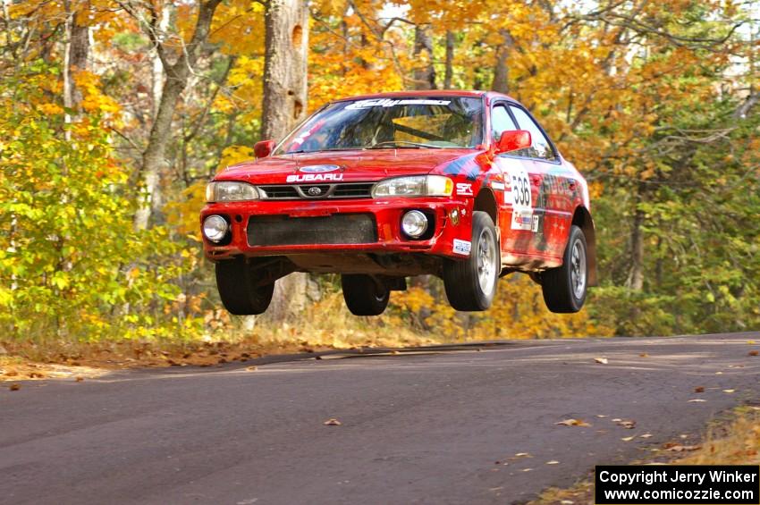 Matt Marker / Ben Slocum	get nice air on Brockway 2, SS14, in their Subaru Impreza.