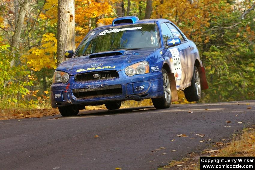 Slawomir Balda / Janusz Topor catch a little air over the midpoint jump on Brockway 2, SS14, in their Subaru WRX.