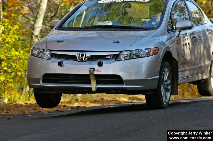 Justin Chiodo / Mike Neisen catch a little air on the Brockway 2, SS14, midpoint jump in their Honda Civic.