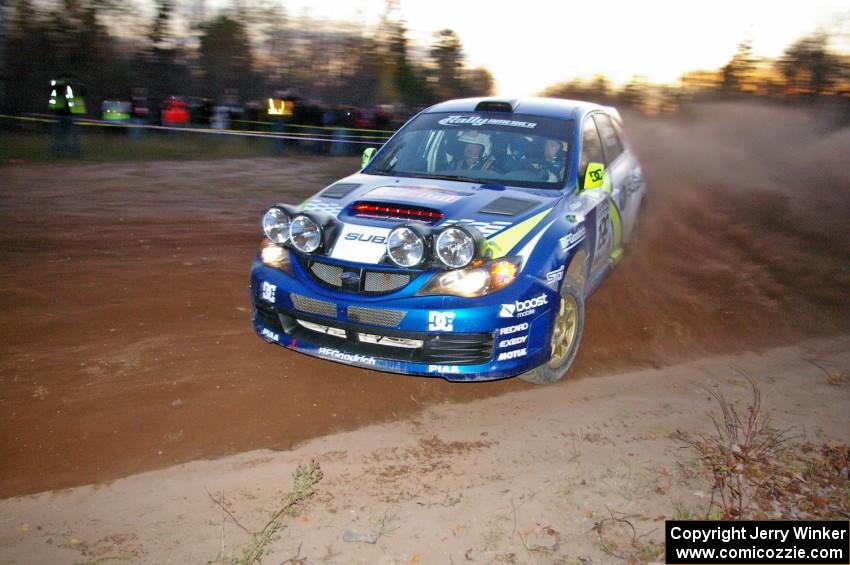 Travis Pastrana / John Buffum drift beautifully past spectators near the finish of SS17, Gratiot Lake 2, in their Subaru WRX STi