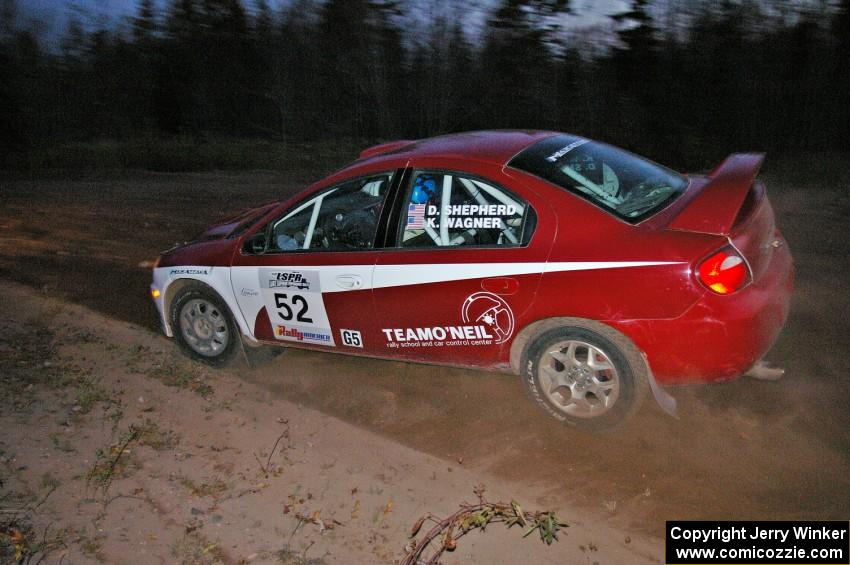 Doug Shepherd / Karen Wagner drift through the spectator corner at Gratiot Lake 2, SS17, in their Dodge SRT-4.