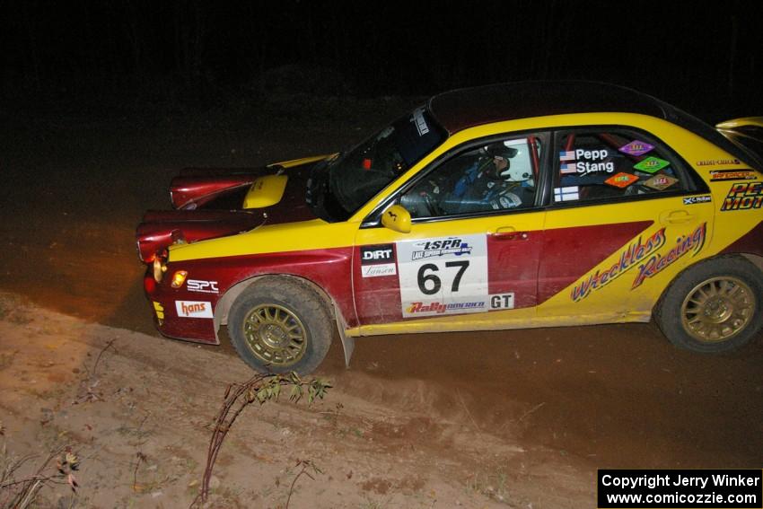 Bryan Pepp / Jerry Stang nicely drift their Subaru WRX through the final spectator corner on SS17, Gratiot Lake 2.