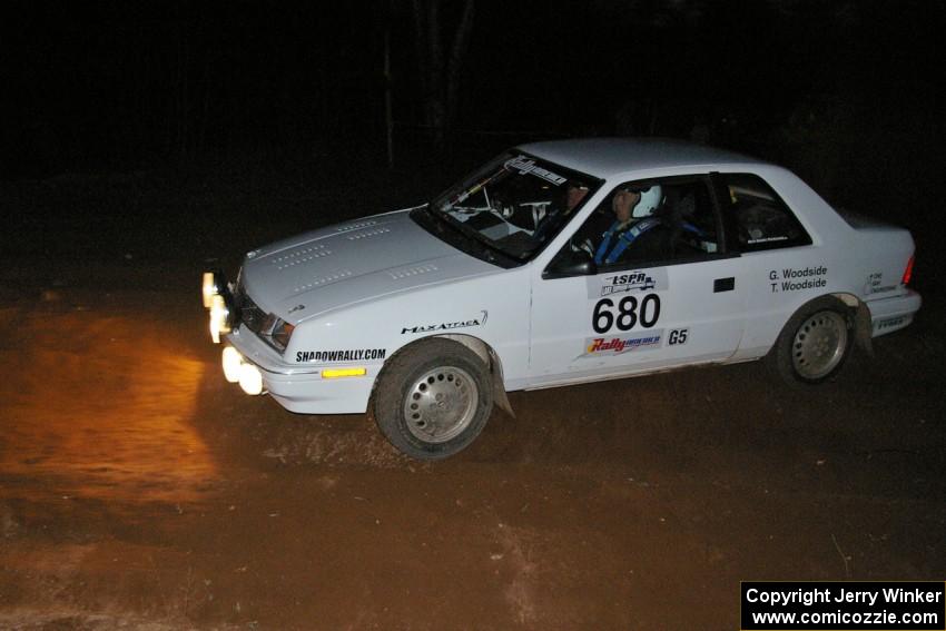 Greg Woodside / Tom Woodside drift their Dodge Shadow through the final corner of SS17, Gratiot Lake 2.