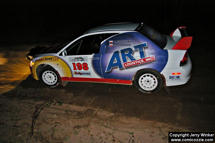 Arkadiusz Gruszka / Michal Chodan drift through the spectator point on SS17, Gratiot Lake 2, in their Mitsubishi Lancer Evo 9.