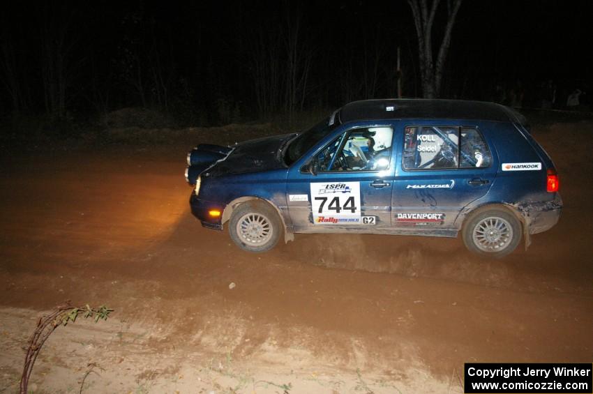 Paul Koll / Carl Seidel drift through the ruts at the spectator location on SS17, Gratiot Lake 2, in their VW Golf.