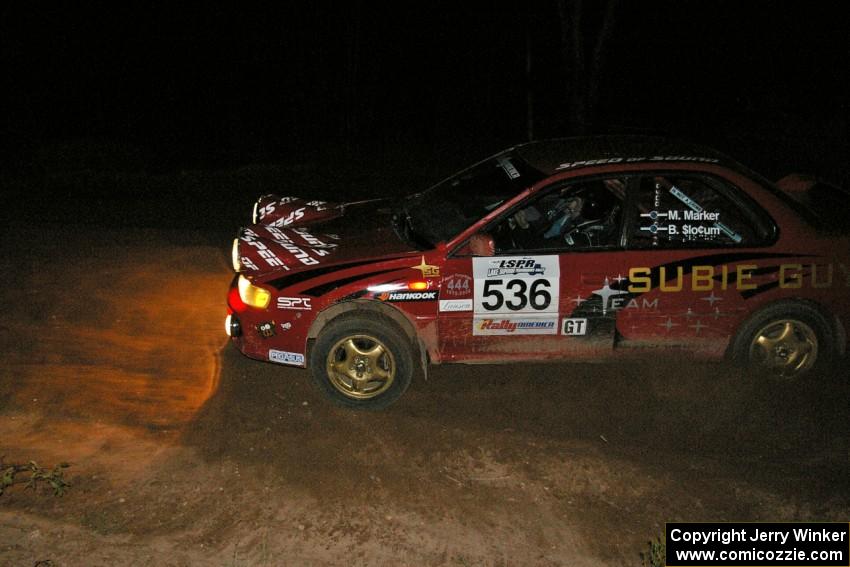 Matt Marker / Ben Slocum	take the final corner of Gratiot Lake 2, SS17, in their Subaru Impreza.