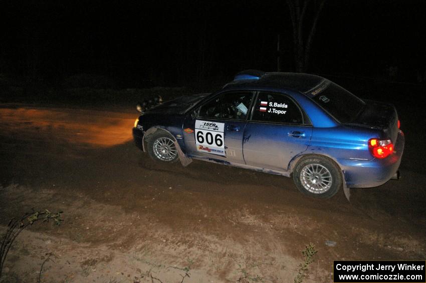 Slawomir Balda / Janusz Topor fight understeer through the ruts on SS17, Gratiot Lake 2, in their Subaru WRX.