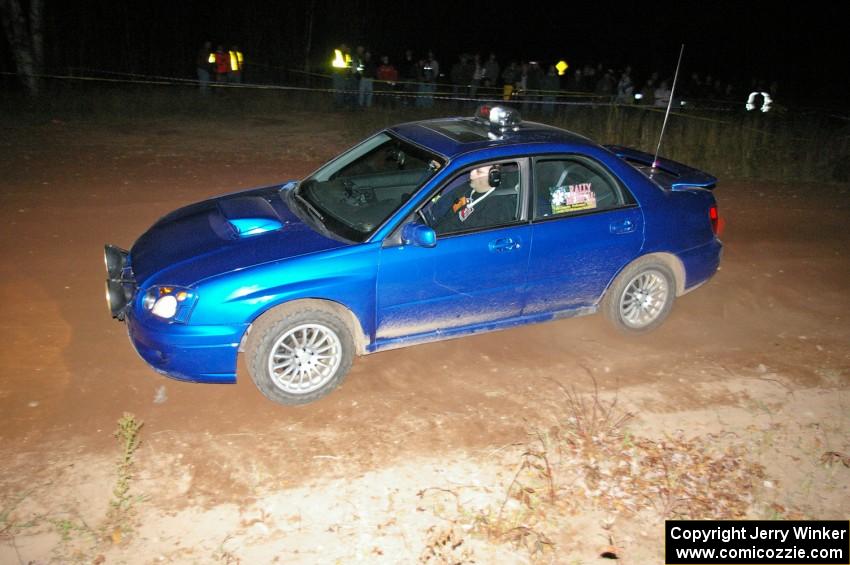 Tim Maskus works as med sweep for SS17, Gratiot Lake 2, in his Subaru WRX.