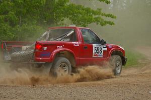 Jim Cox / Dave Parps drift their Chevy S-10 onto Potlatch Rd. on SS1.