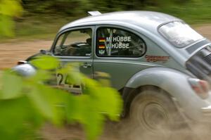 Mark Huebbe / John Huebbe drift their VW Beetle onto Potlatch Rd. on SS1.