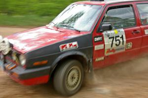 John Kimmes / Greg Smith drift their VW GTI through a hard left on SS1.