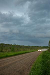 The '0' Subaru Legacy of Amy Springer checks out SS2 before the storm hits.