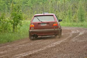 John Kimmes / Greg Smith drift through a left-sweeper on SS4 in their VW GTI.