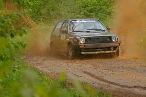 Dave Cizmas / Matt Himes hit a large puddle on SS5 in their VW GTI.