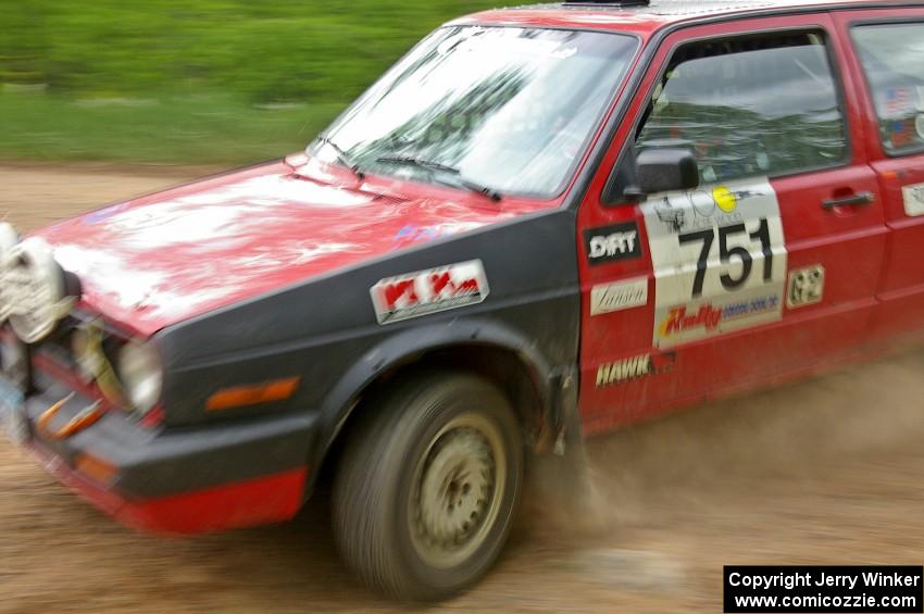 John Kimmes / Greg Smith drift their VW GTI through a hard left on SS1.