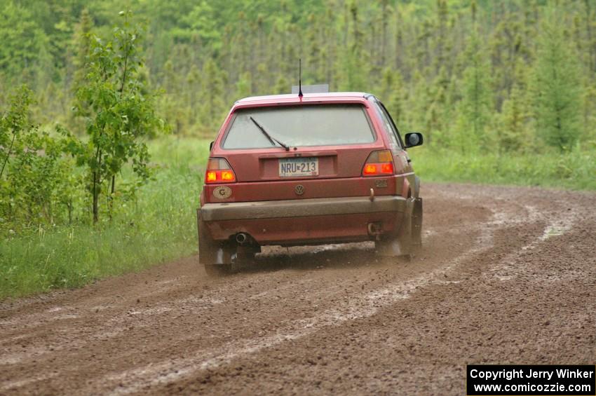 John Kimmes / Greg Smith drift through a left-sweeper on SS4 in their VW GTI.