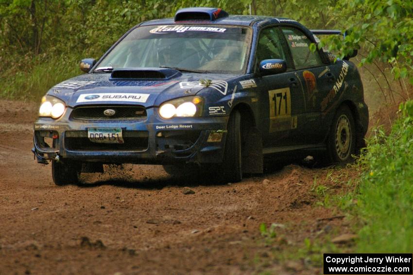 Carl Siegler / David Goodman take it to the edge of the sloppy road on SS6 in their Subaru WRX STi.